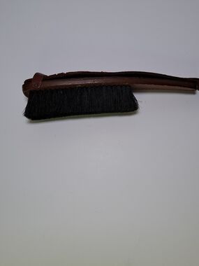 Vintage Leather Shoe Brush with Leather Shoehorn attached.